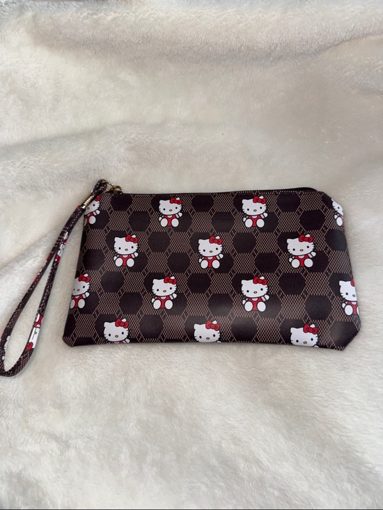 Hello Kitty Handbags - Hello Kitty Brown and White Patterned Wristlet Clutch with Red Accents